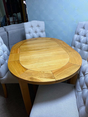 Round light wood dining table - wood,