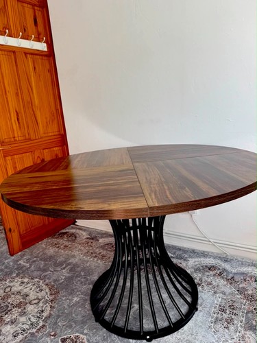Round dark wood dining table - wood,
